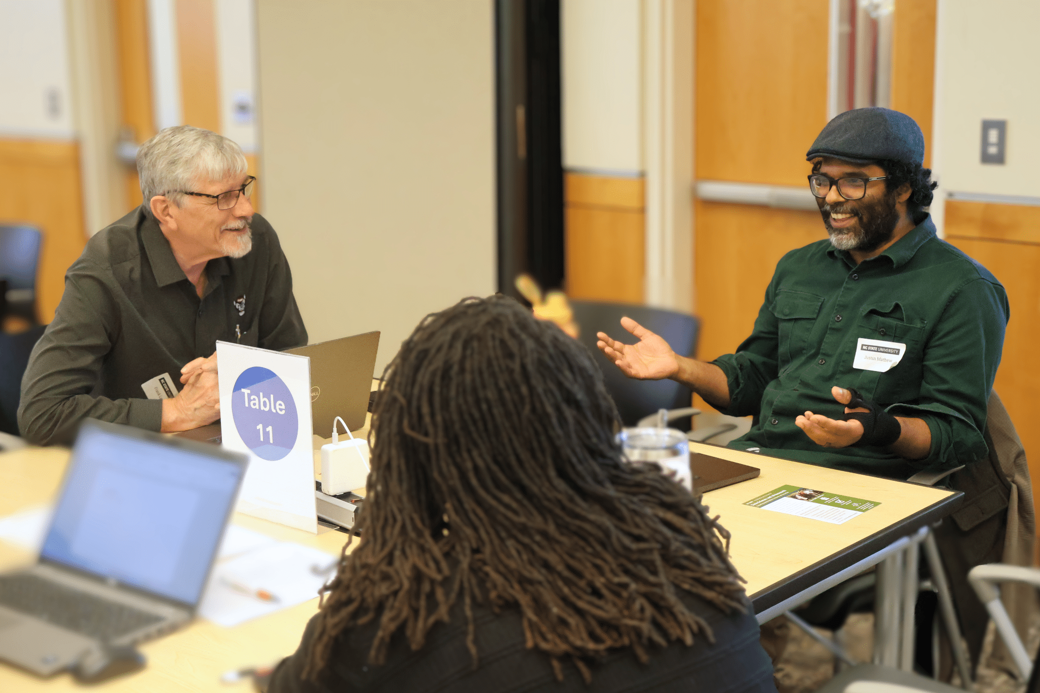 AI Fellow and Associate Teaching Professor Director of Undergraduate Programs Music Technology Program Director, Justin Matthew (right), leads participants in a discussion.